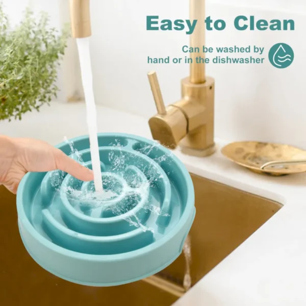 10003 Dog eating from non-slip round puzzle slow feeder bowl indoors
