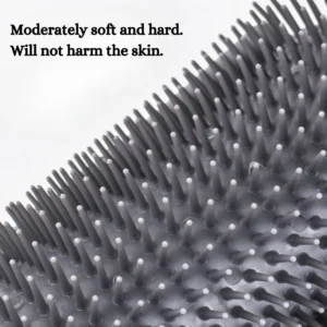 Close-up of cat corner massage brush showing durable soft bristles and removable comb