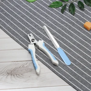 Pet owner trimming dog’s nails using ergonomic nail clippers – ideal for grooming salons and retail use