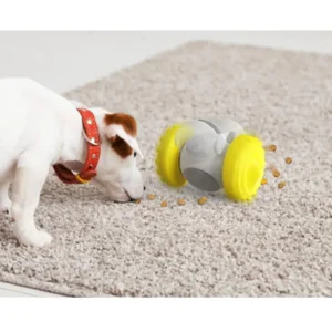 10004 Dog playing with robot shaped interactive tumbler toy food dispenser