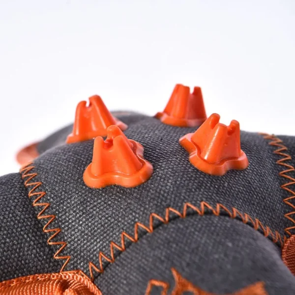 10004 Close-up of chew cube dog toy with reinforced stitching and squeaky design for durability.