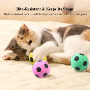 Cat chasing lightweight foam soccer toy ball, demonstrating bounce and interactive movement.