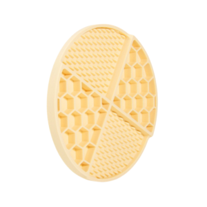 Yellow silicone dog licking mat with textured surface