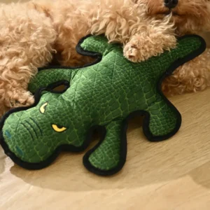 Squeaky crocodile dog toy showing built-in squeaker and bite-resistant plush fabric