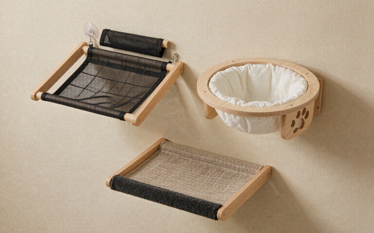 Cat window perches and hammock mounts flat-lay on a beige background